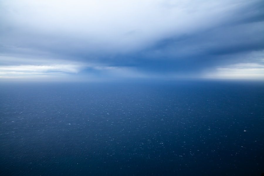 Deep blue open ocean meeting the sky at the horizon