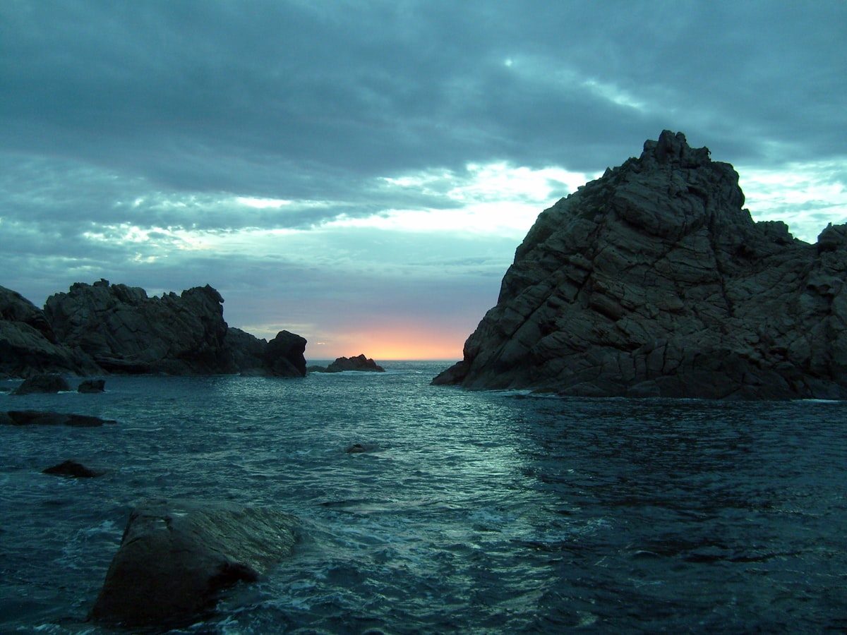 Sugarloaf Rock at sunset on the Cape to Cape coast