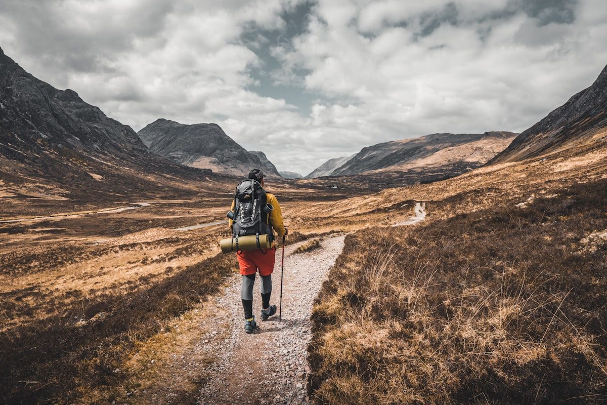 A lone walker on the West Highland Way through Glencoe